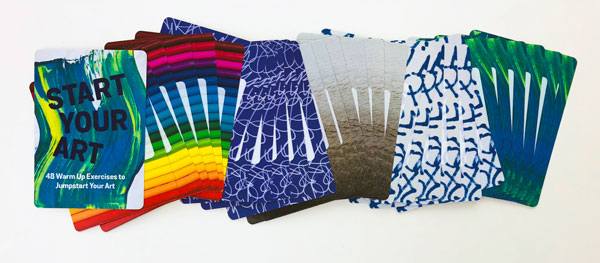 line of colorful cards, top card says start your art