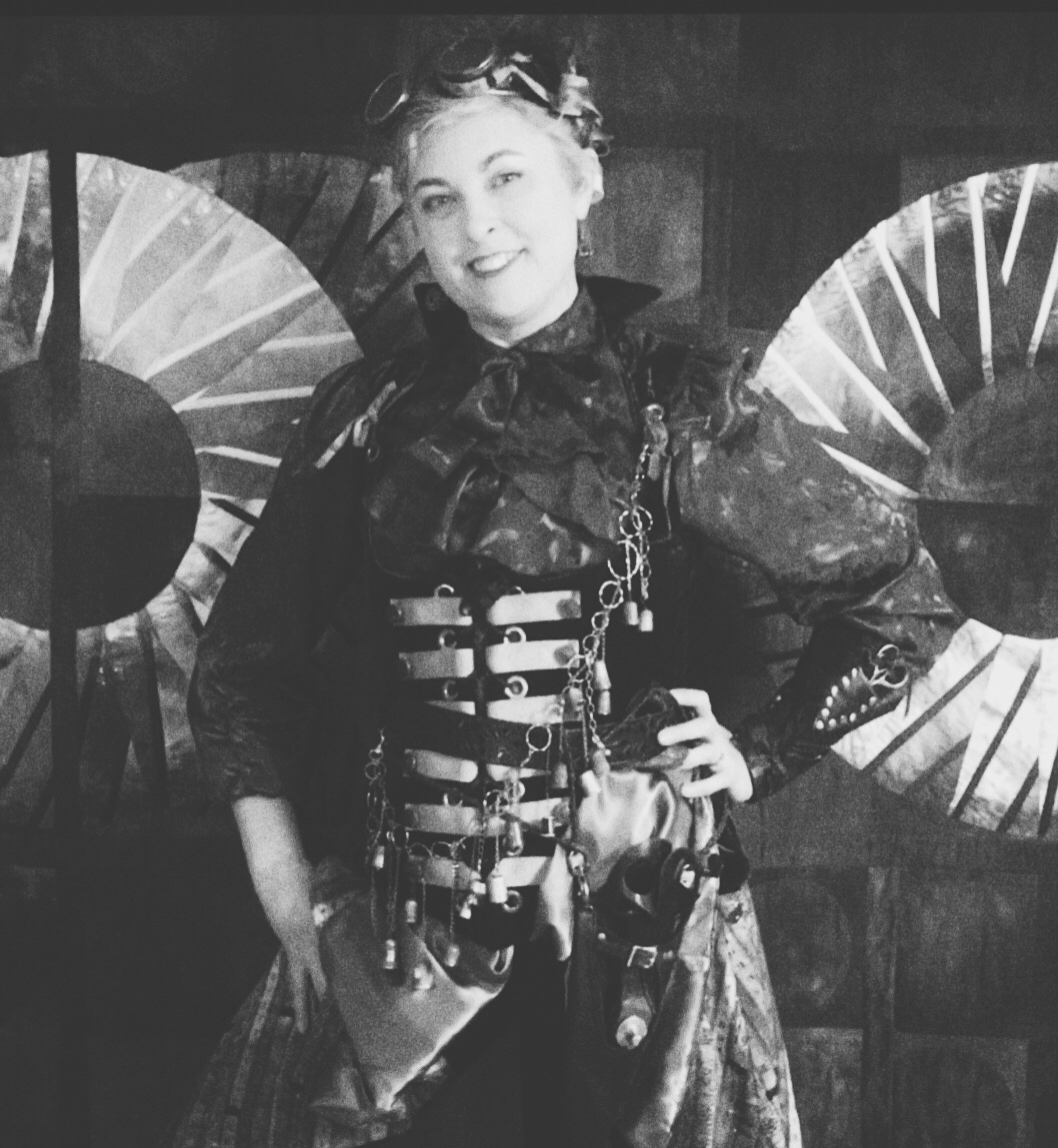 black and white picture of lyric kinard dressed up as a steam punk seamstress